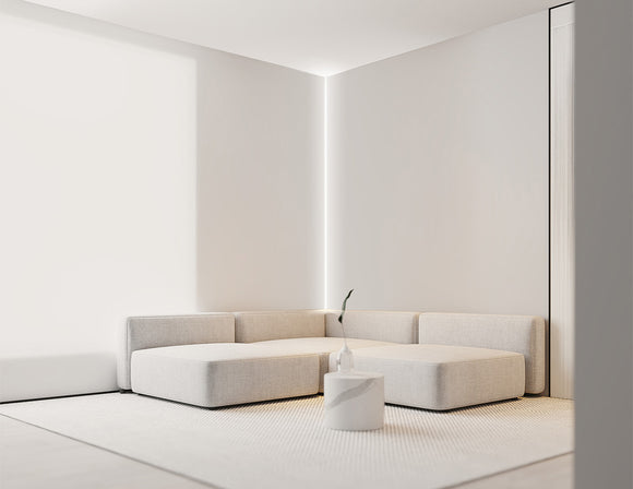 LED strip lights are used in an aluminum channel to create a unique lighting design in a living room.