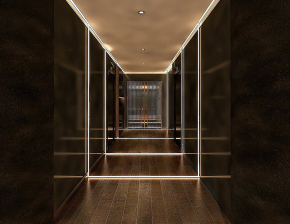 A hallway is decorated with LED strip lights that are powered by a dimmable low voltage driver.