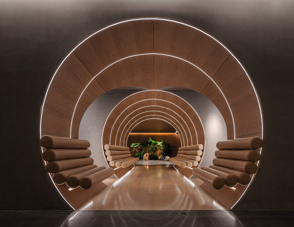 Top Bend 3D neon light seamlessly installed along the inner wall of a curved architectural channel, highlighting the contour with smooth, uniform illumination.