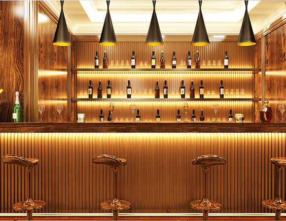 LED strip lights are used in an aluminum channel to illuminate a bar.