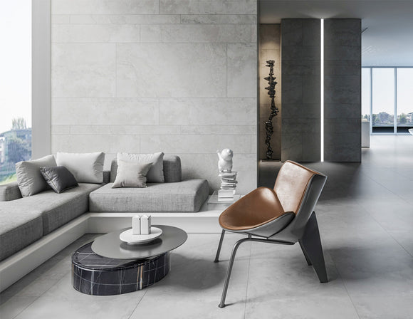 LED strip lights are used in an aluminum channel to illuminate a living room.