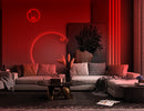 Vivid red 3D neon lighting accentuating the contours of a modern living room, creating a bold and dynamic atmosphere.