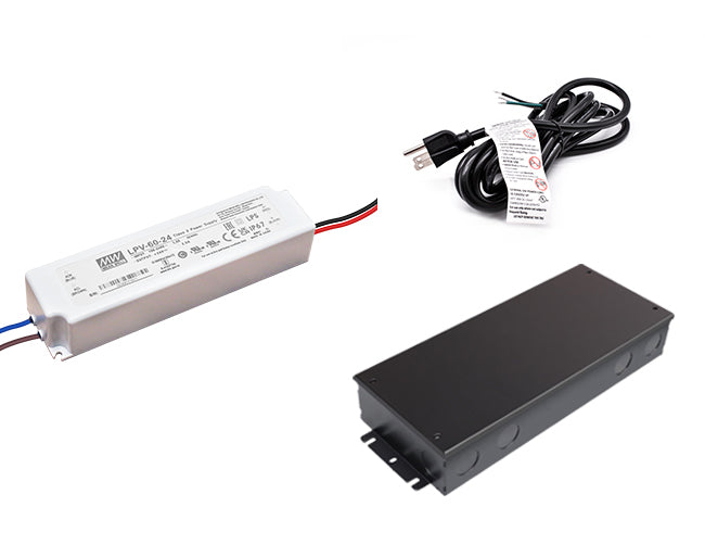 60W 24VDC LED driver with black junction box and black three-prong power cord for line voltage.