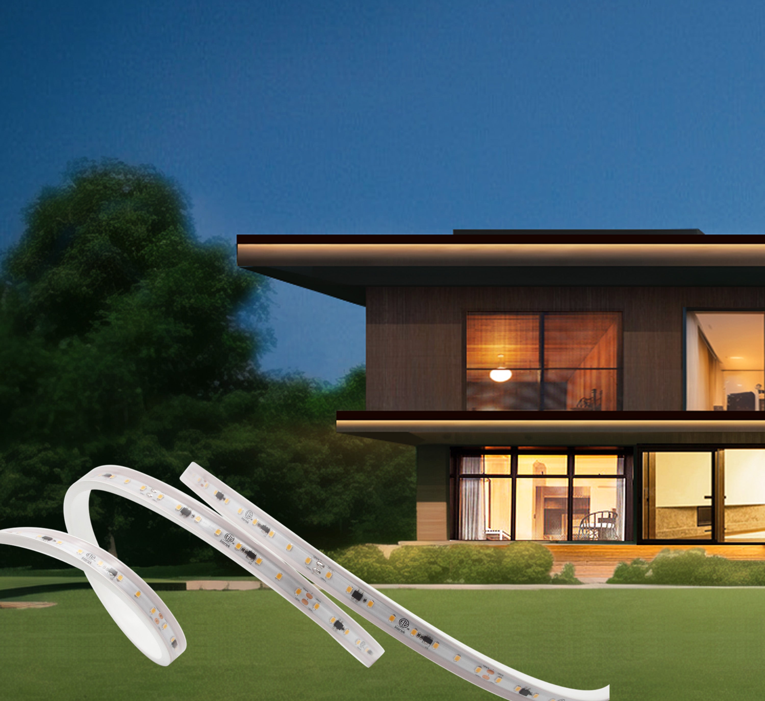 A modern home exterior at twilight featuring GL 120V LED strip lighting that accentuates the architectural details. The warm indoor lighting contrasts with the darkening sky, while a strip of LED lights curves dynamically in the foreground, indicating a home lighting solution. Lush greenery surrounds the property, enhancing the serene and upscale ambiance.