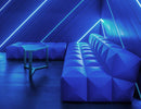 A seating area is decorated with blue LED strip lights that are powered by a dimmable low voltage transformer.