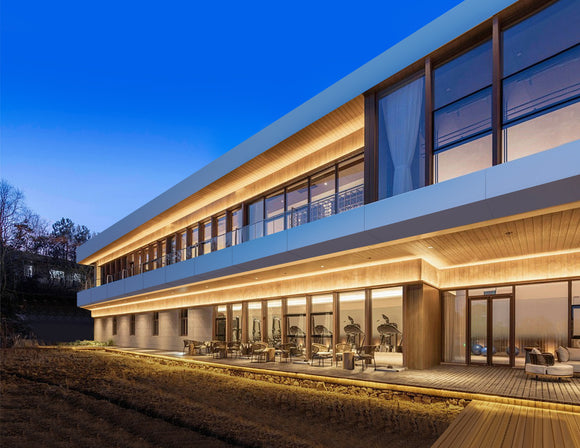 Dimmable warm LED strip highlights the edge of an outdoor ceiling, enhancing the architectural lines.