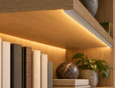 GLQ 2207B Silver Aluminum Channel installed under a wood shelf, providing soft indirect LED lighting for bookshelf and display applications.
