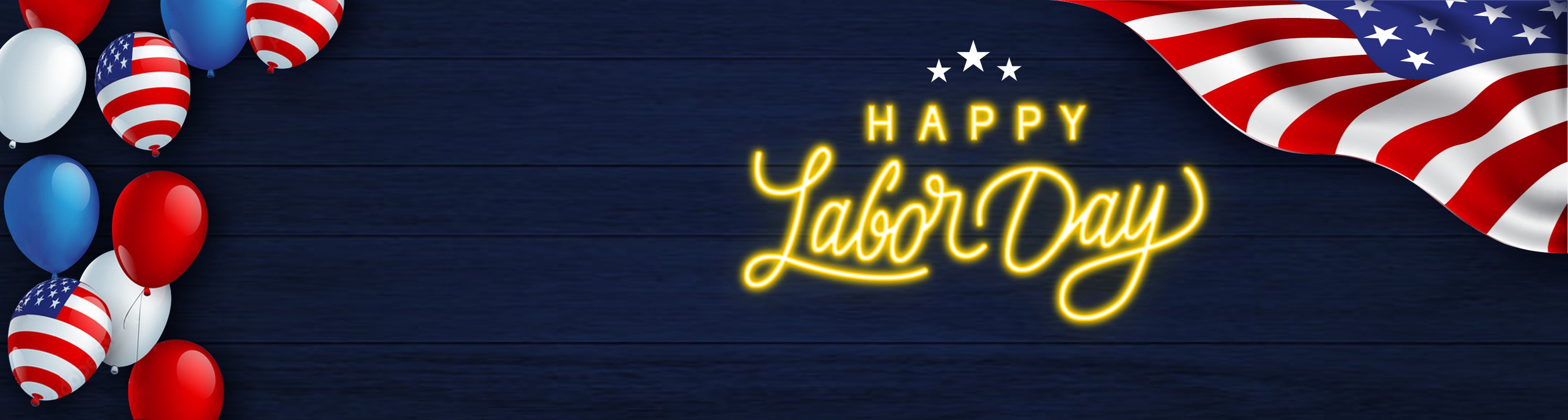 Illuminated 'Happy Labor Day' sign crafted from vibrant LED lights, accompanied by a prominent US flag and an array of celebratory US flag balloons.