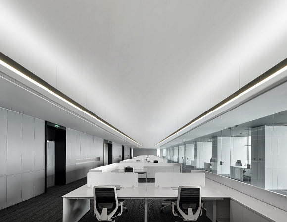 L8070 LED linear light with No Glare Lens suspended from office ceiling, providing glare-free and uniform lighting