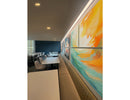 Restaurant interior equipped with wall-washing LED lighting; L8070 lights brighten both artwork and wall background