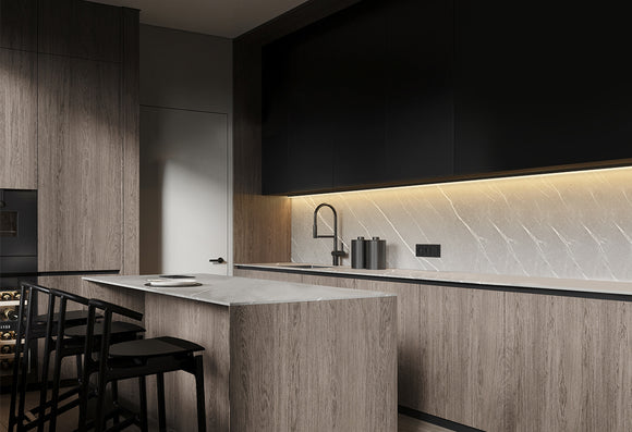 LED strip lights are used in an aluminum channel to illuminate kitchen undercabinets.