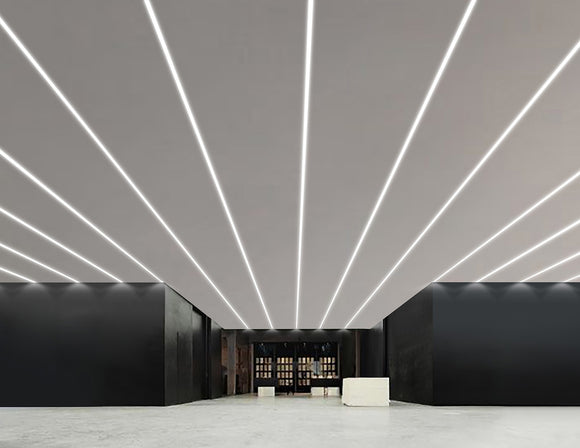 LED strip lights are used in an aluminum channel to create a unique lighting design.