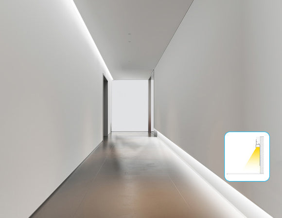 LED strip lights are used in an aluminum channel to illuminate a hallway.