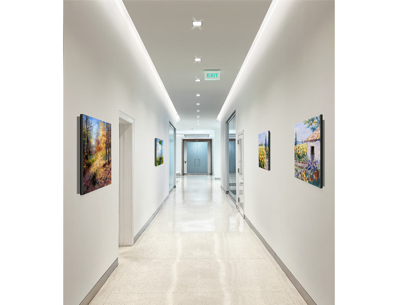 A modern office uses LED strip lights to illuminate a hallway.