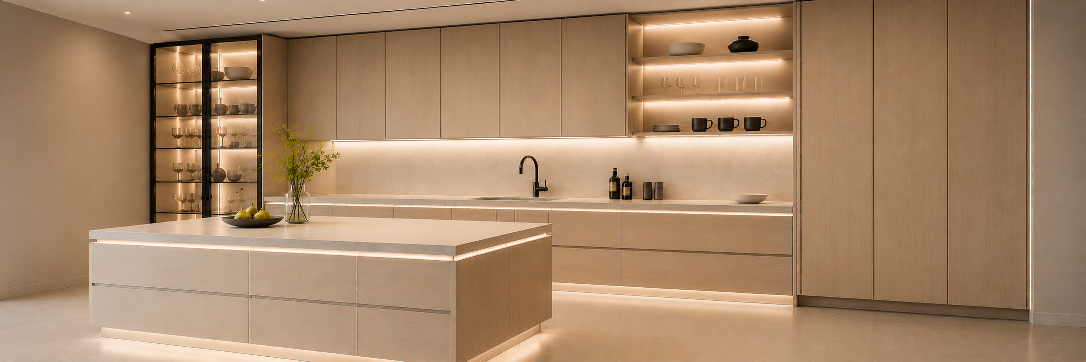Modern kitchen featuring integrated Undercabinet Lighting with concealed linear LED illumination beneath wall cabinets, creating a seamless architectural lighting effect for premium residential cabinetry applications.