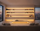 Recessed undercabinet LED strip lighting integrated into floating shelf display wall, providing uniform 3000K warm white linear illumination for residential and commercial architectural projects