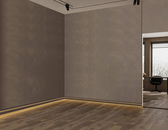 Architectural aluminum skirting profile SHALLOW SKIRT J016B, ideal for elegant wall-to-floor transition lighting.