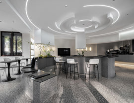 Curved Side Bend neon light emitting crisp 6500K cool white glow, mounted on the living room ceiling for clean, modern illumination.