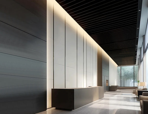 Dimmable flicker-free LED strip with 3000K warm light installed on reception ceiling of lobby.