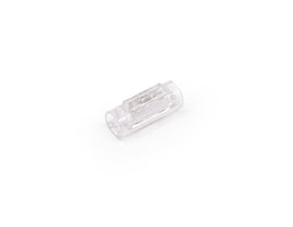 Transparent solder-free wire connector for low voltage LED strip and cabinet lighting applications