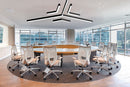 Architectural Y-shape suspended linear LED light creating uniform ceiling illumination in modern office meeting space