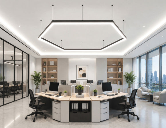 GL LED US LIGHTING L8070 LED Linear Light with Milky Flat Lens and 120° L Shape connectors, creating a suspended geometric lighting design above a modern open office workspace.