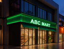 Retail storefront illuminated by LED Mini Module - Green, featuring bright green channel letter signage and commercial branding lighting for modern retail environments.