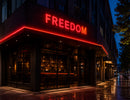 Commercial storefront signage illuminated by LED Mini Module - Red, creating vibrant red channel letter lighting for retail branding and architectural facade applications.