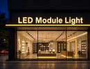 LED Module Light - LED Mini Module - Yellow illuminating channel letter signage on a modern lighting showroom storefront with bright and uniform commercial branding illumination.
