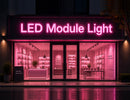 Modern storefront featuring LED Module Light - Pink illuminated channel letter signage, creating a vibrant architectural lighting effect for commercial branding and retail facade applications.