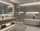 Luxury modern bathroom illuminated with GL LED US LIGHTING LED Strip Light - COBCC3 White - IP67, featuring seamless 4000K neutral white lighting behind the vanity mirror, beneath the floating cabinet, inside shower niches, and around the ceiling perimeter. The waterproof COB LED Strip Light delivers smooth dot-free architectural illumination for humid bathroom environments, creating a clean, elegant spa-inspired atmosphere for residential and hospitality lighting projects.
