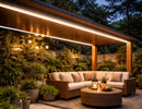 IP67 LED strip light installed along outdoor pergola roof, providing warm 3000K linear lighting for patio seating area, ensuring durable and weather-resistant performance in exterior environments.