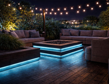 RGBW IP67 LED strip light integrated into outdoor fire pit seating and deck steps, delivering blue linear accent lighting for landscape and architectural outdoor lighting design.