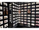 Recess Mount LED Cabinet light applied in retail eyewear display wall, featuring uniform backlit shelves with glare-free illumination for premium product presentation