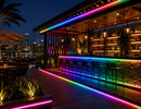 RGB SPI LED Strip - Digital Color-Chasing LED Tape Light integrated into an outdoor bar, creating programmable multicolor lighting along counters, rooflines and pathways.