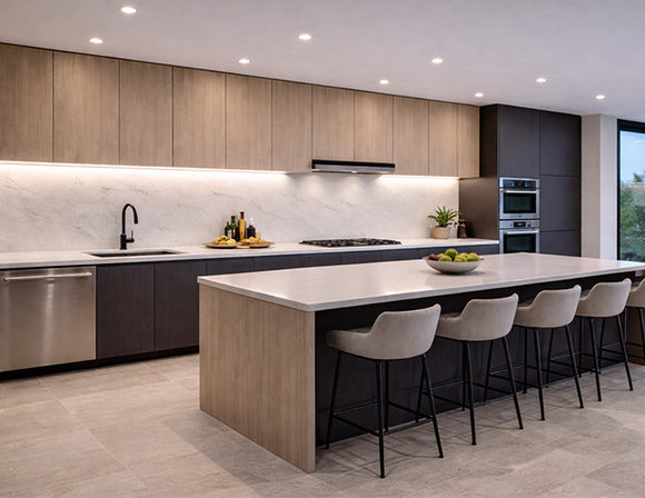 Modern luxury kitchen featuring Surface Mount Under Cabinet Light installed beneath upper cabinets, providing seamless and uniform task lighting across the countertop while enhancing the warm wood cabinetry and contemporary island design. Ideal for residential and commercial kitchen lighting projects by GL LED US LIGHTING.