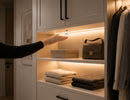 Wired Independent Control - Wave Sensor Dimmer installed in a wardrobe cabinet, allowing convenient hand wave activation of integrated lighting without touching the sensor.