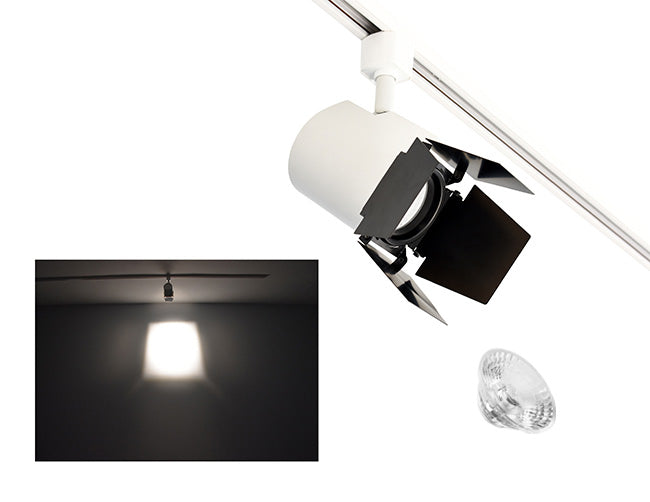 The image showcases the lighting effect produced by a white color track light with a barn door and a 24° lens, revealing a distinct rectangular bright spot on the wall targeted by the track light.