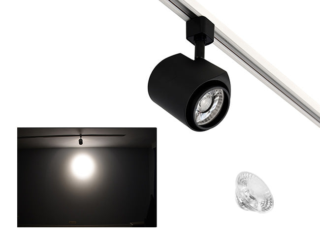 The image showcases the lighting effect produced by a black standard track light with a 24° lens, revealing a smaller and brighter circular light spot on the wall targeted by the track light.