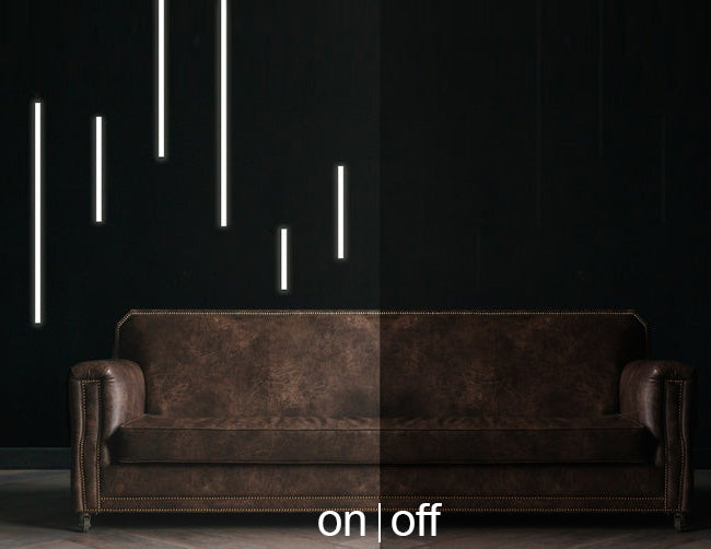 LED strip light fixtures using slim flat YD 1201 black aluminum channel and black diffuser are installed on a living room wall. A contrast picture is shown with light on in the half of the area, and light off on the other half of the area.