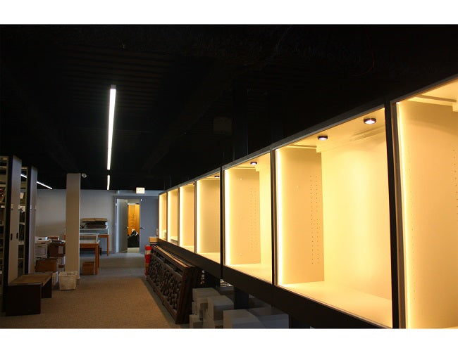 LED strip light fixtures with round corner-s YD 1002 aluminum channels are installed in separate display cabinets.