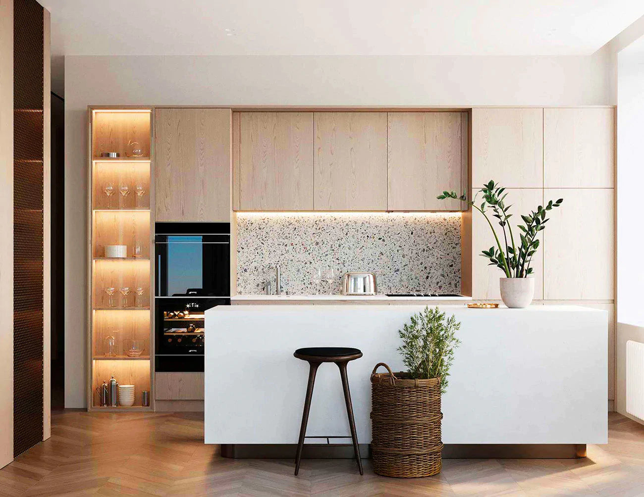 Undercabinet lights illuminate counter backsplashes in a kitchen space.