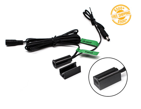 A black door sensor switch with wires to both a power supply and LED strip lights. A label of free shipping for orders over $500 is shown as well.