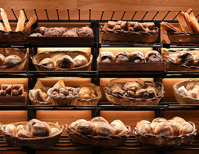 A display case for bread is decorated with LED strip lights that are powered by a dimmable LED low voltage driver.