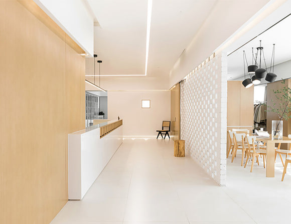 LED strip lights are used in an aluminum channel to illuminate a restaurant.