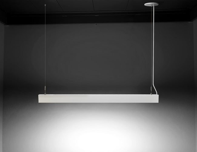 A white color GL LED L8050 linear light fixture is suspended from ceiling.