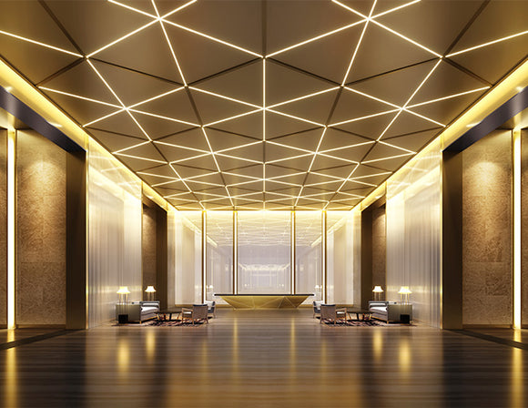 A hotel lobby is decorated with LED strip lights that are powered by a dimmable low voltage transformer.