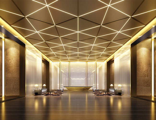 A hotel lobby is decorated with LED strip lights that are powered by a dimmable low voltage transformer.