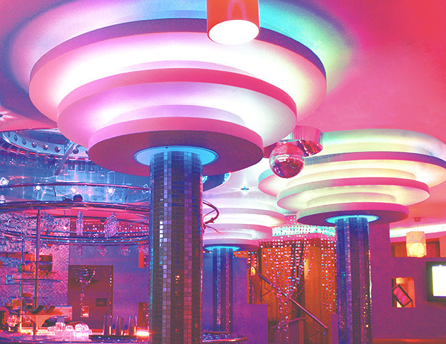 A club lounge is decorated with RGB SPI LED strip lights that are powered by a dimmable low voltage transformer.