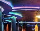 A club is decorated with RGB SPI LED strip lights that are powered by a dimmable low voltage transformer.